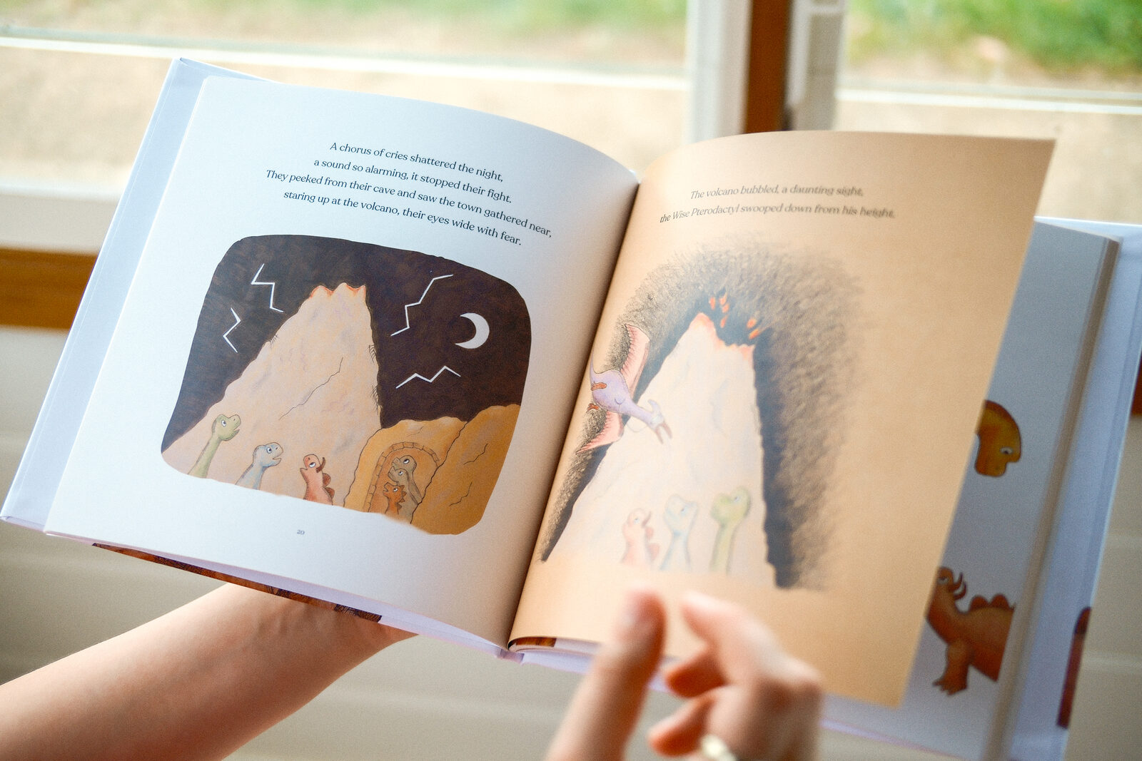 An open spread of Spike's Big Roar showing the volcano illustration